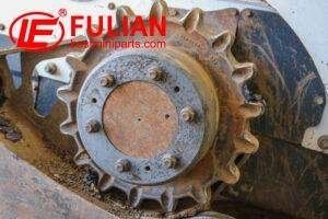 can worn sprockets damage the tracks of a mini excavator