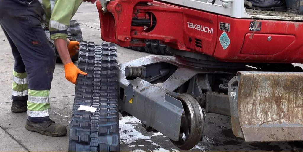 how sprockets and idlers keep your excavator running smoothly